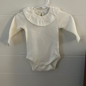 0-3 mon. Jamie Kay white onesie with ruffle neck line